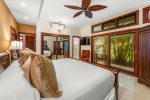 Spacious and serene with custom furnishings and tropical accents